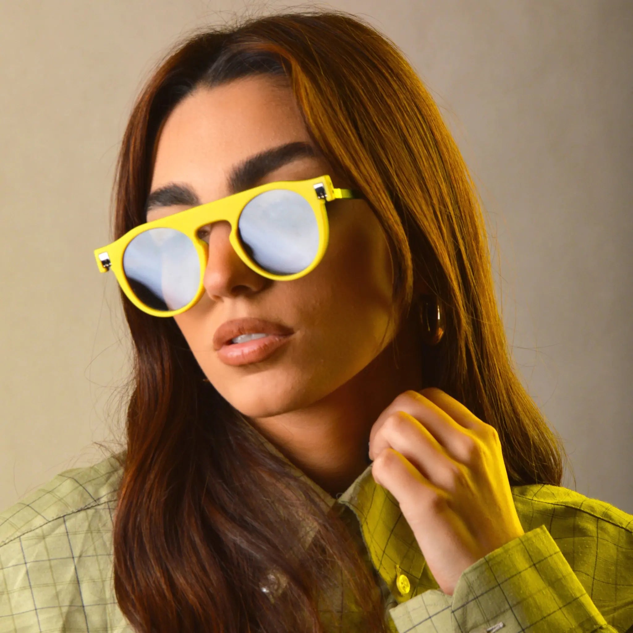 Reverso Sunglasses Dark Green & Cream on Brunette Woman